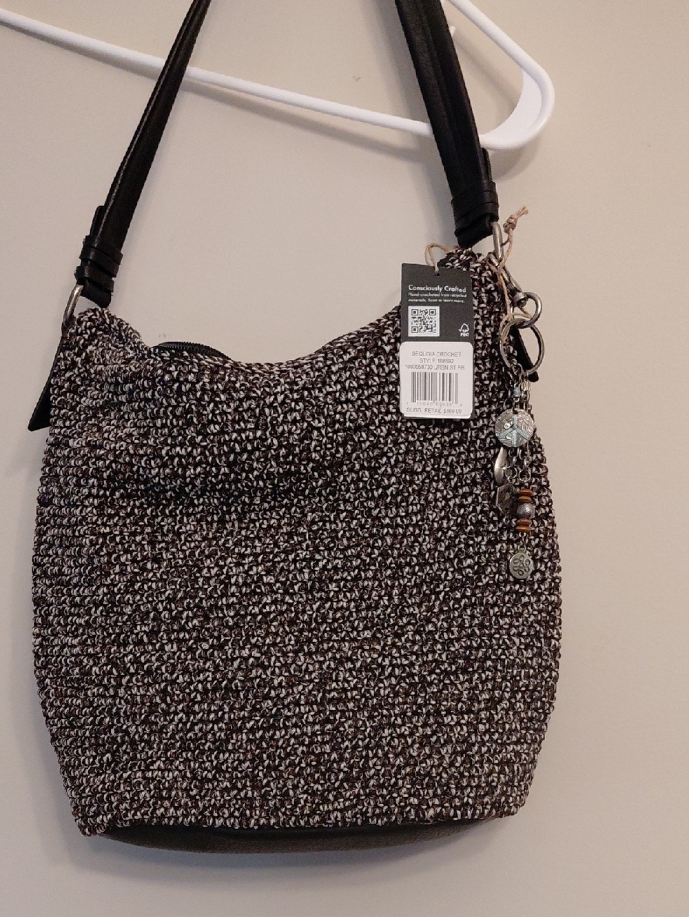The Sak Woven Black & White Shoulder Bag with Charm Detail